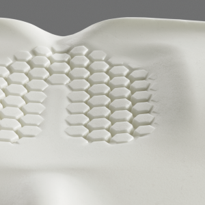 Close up view of the Axiom S and G Wheelchair Cushion - Pressure relief cushion designed for comfort and skin protection, featuring a viscoelastic memory foam core and a variety (depending on model) of additional support elements.