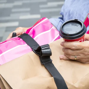 Close up image of the LapStacker XD for Permobil Wheelchair - Retractable carry strap system designed for Permobil power wheelchairs, offering versatile and secure carrying options for various items.