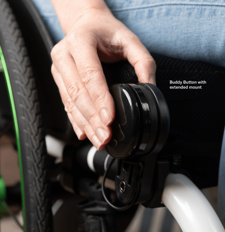 Close up image of the Smartdrive MX2+ Powered Wheelchair Attachment - A motorized attachment unit that connects to a manual wheelchair, transforming it into a power-assisted wheelchair.