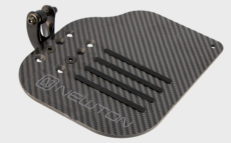 Image of the Newton Carbon Footplate - Lightweight, durable, and adjustable wheelchair footplate made of carbon fiber for improved maneuverability and comfort.