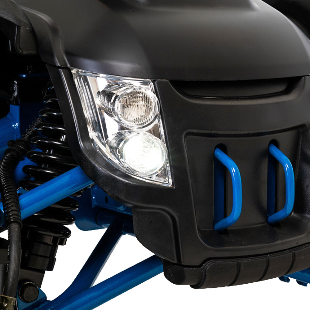 Close up view of the blue Baja Wrangler 2 Off-Road Wheelchair - All-terrain, manual wheelchair with knobby tires and durable frame, designed for outdoor adventures and navigating rough terrain.