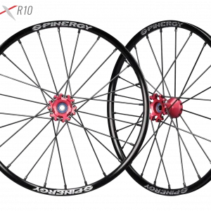 Image of the Spinergy XSLX R10 Wheelchair Wheel - High-performance, lightweight wheelchair wheel featuring a durable X-laced spoke pattern and reinforced axle for increased strength and durability.