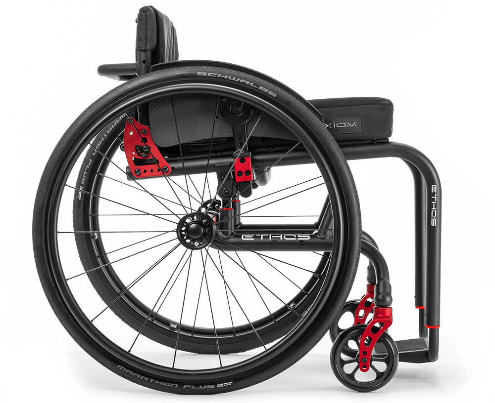 Right side view of the versatile black and red Custom Rigid Ethos Wheelchair.