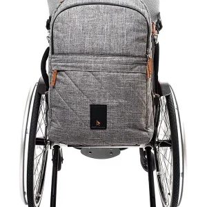 Front view image of the Kinetic Balance Travel Backpack on a wheelchair - Stylish and functional backpack designed for comfortable travel, featuring multiple compartments for organized packing.