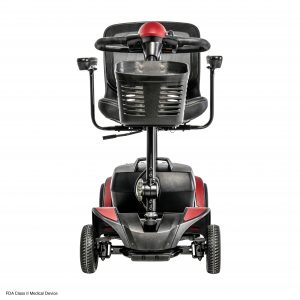 Frontal view of the red Go-Go Elite Traveller 2 - Four-wheel mobility scooter with a user-friendly control panel, tight turning radius, and a comfortable swivel seat with removable colored panels