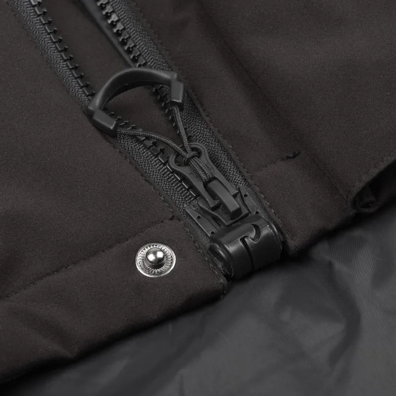 Close up view of the black Kinetic Balance QT Jacket - Lightweight, quilted jacket designed for wheelchair users, offering warmth and comfort during cooler weather.