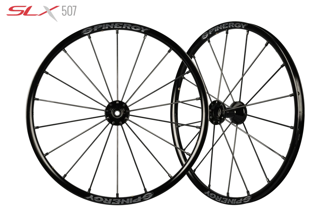 Frontal and side image of the Spinergy SLX 507 Wheelchair Wheel - High-performance, lightweight wheelchair wheel featuring a 7-spoke design for optimal rigidity and responsiveness.