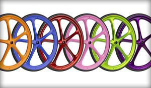 Images of the colored Maxx Mag Spoke Wheelchair Wheel - Lightweight, high-performance wheelchair wheel featuring a unique spoke design for improved strength, durability, and aesthetics.