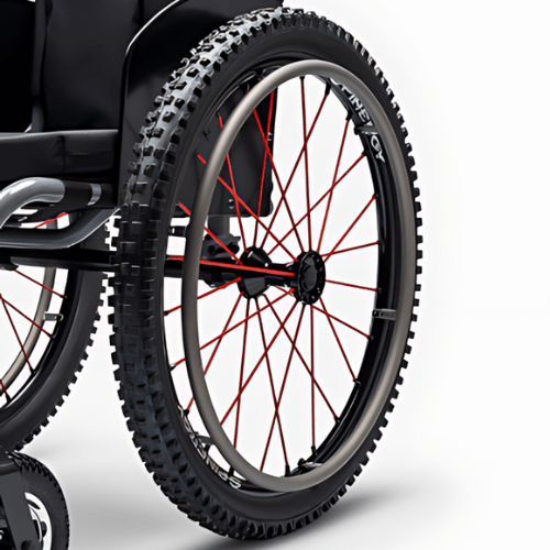 Close up of the Top End Crossfire All-Terrain Wheelchair - Rugged wheelchair with large knobby tires, designed for navigating diverse outdoor terrains with ease and stability.