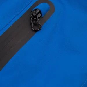 Close up Image of the blue Kinetic Balance Raindek - Waterproof leg cover for wheelchair users, providing protection from rain and wind while maintaining comfort and mobility.