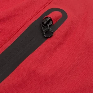 Close up Image of the red Kinetic Balance Raindek - Waterproof leg cover for wheelchair users, providing protection from rain and wind while maintaining comfort and mobility.