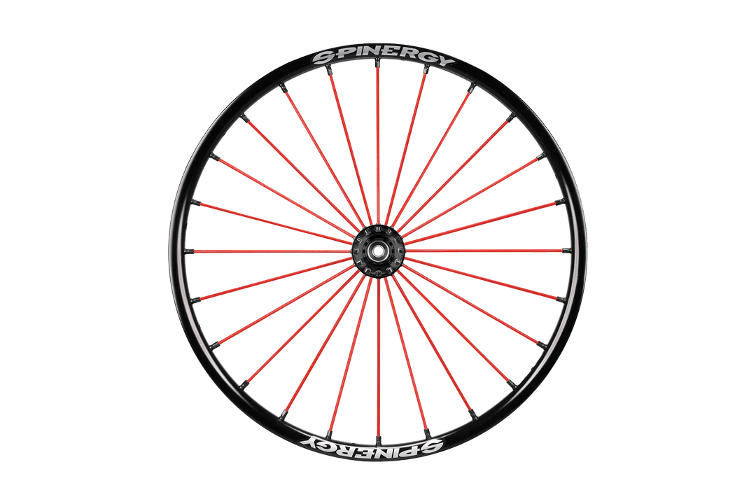 Frontal view of the red Spinergy SLX 24 Spoke Wheelchair Wheel - Durable and high-performance wheelchair wheel with 24 spokes for maximum stability and responsiveness.