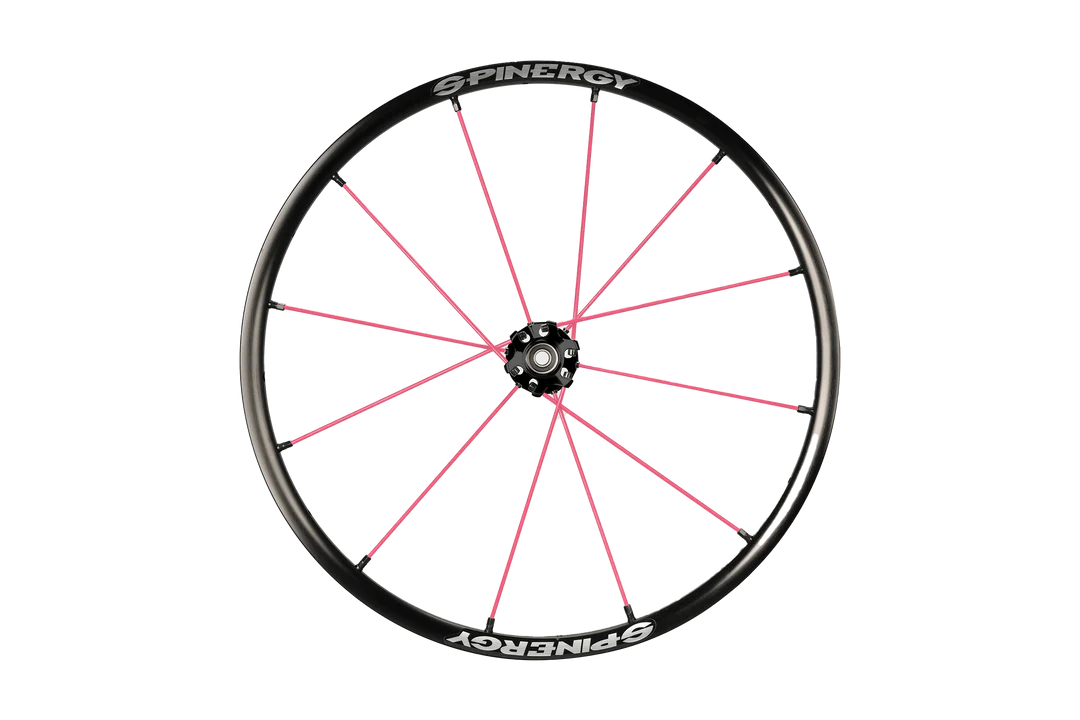 Front view of the pink Spinergy XLX Wheelchair Wheel - Lightweight, high-performance wheelchair wheel featuring a cross-laced spoke design and a flexible urethane pushrim for comfort and maneuverability.