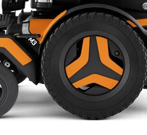 Close up image of the Permobil M3 orange Corpus Color Kit - Customizable color panels for the Permobil M3 wheelchair, allowing users to personalize their wheelchair's appearance.